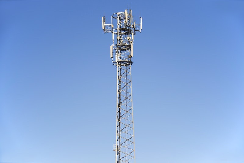 Telecommunications tower with antennas. Free public domain CC0 photo.