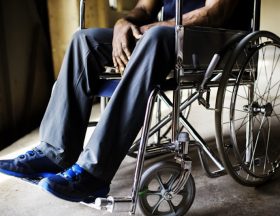 Disabled african man sitting on the wheelchair